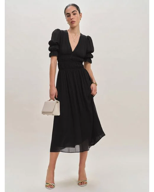 Leto u crnom: Kako nositi najtamniju boju ovog leta? 13 reformation Black Cyrus Dress
