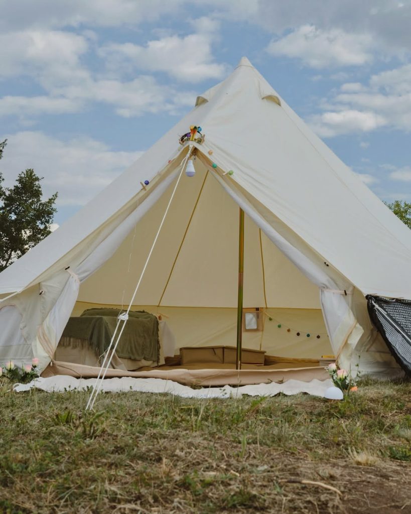 Find ultimate comfort and peace with our Pyramid Village Ticket featuring the cozy Tipi Tent Ex