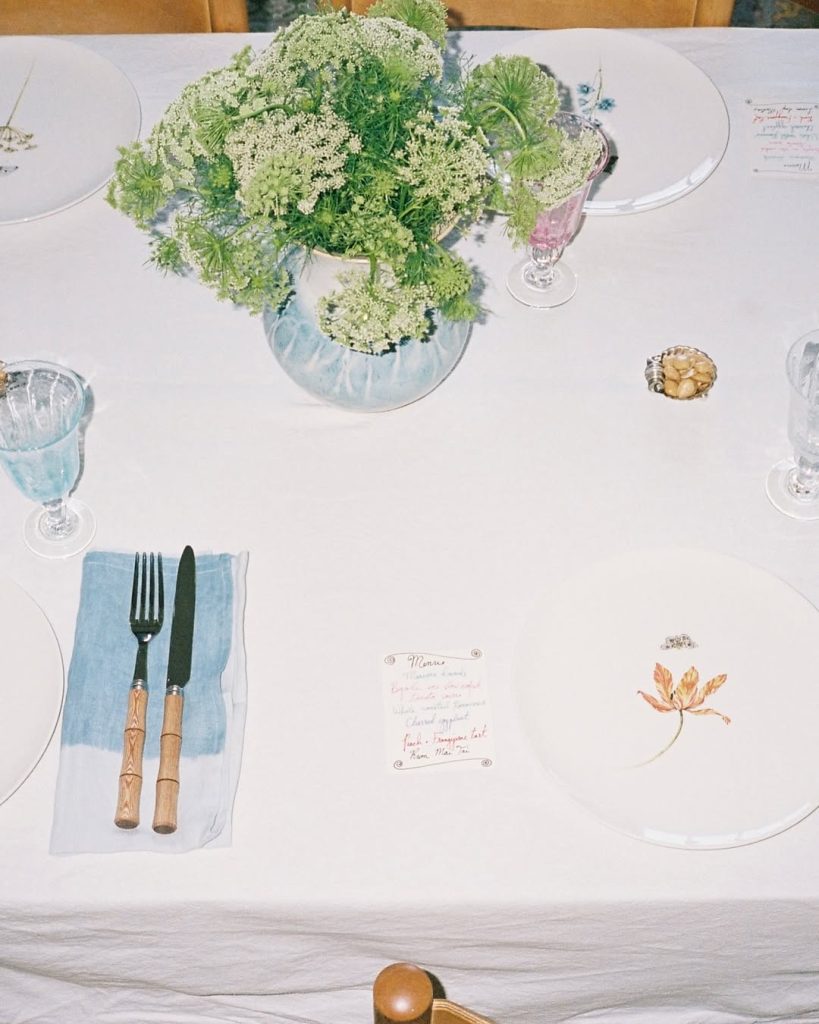 A recent table I created at home using unique hand painted plates no dish is the same the cu3