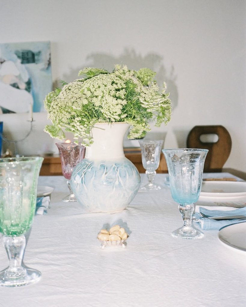 A recent table I created at home using unique hand painted plates no dish is the same the cu6
