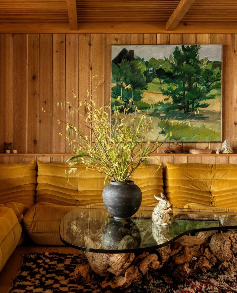 Designer @loversunite wrapped this room in cedar and Douglas fir a warm backdrop for deep tones